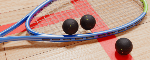 Drei Squashb&auml;lle auf einem Squashschl&auml;ger