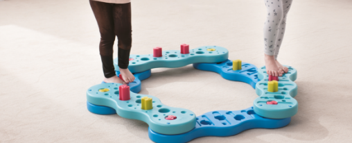 Psychomotorik Material wie Bewegungsspiele, Bohnens&auml;ckchen, Gruppenspiele und Rollbretter f&uuml;r therapeutische F&ouml;rderung