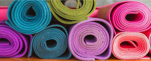 Gymnastikmatten kaufen Bunte aufeinander liegende Gymnastikmatten